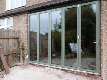 MOLD , NORTH WALES : Centor C1 Bi Folding doors triple glazed with 44mm seled units . Example of aluminium triple glazed bi-fold doors. Aluminium bi-fold doors near Macclesfield SK11. Alumnus doors with 44mm triple glazing near Alderly Edge SK9. Aluminium Bi-fold doors near Wirral CH48 CH60. Alumnus Bi-fold doors triple glazed Liverpool Formby L37 near South Port PR8 Bi-fold doors near Crosby L23